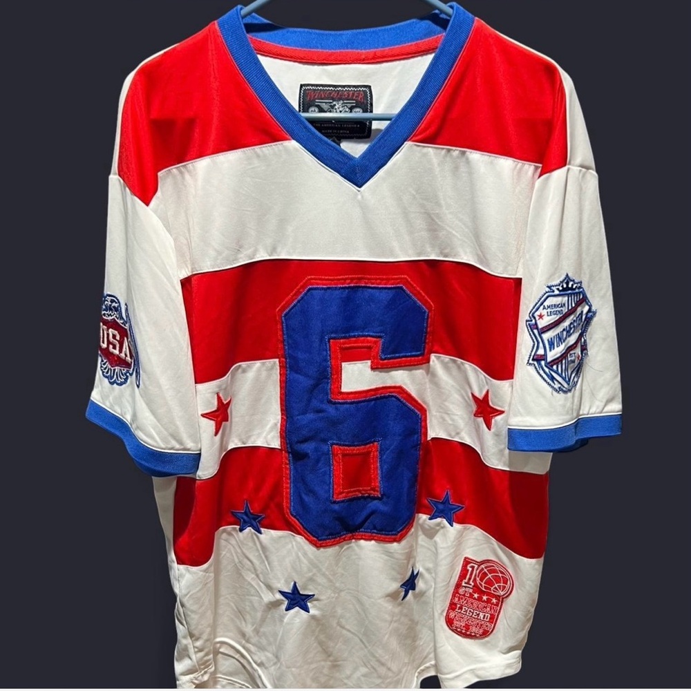 Red and White Jersey with Blue Accents